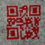 Embroidered QR code from Kuusk, Kristi, Stephan Wensveen, and Oscar Tomico. 2014. “Crafting Qualities in Designing QR-Coded Embroidery and Bedtime Stories” 